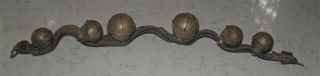 ANTIQUE STRAND OF LARGE HORSE BRASS SLEIGH BELLS ON LEATHER STRAP 5