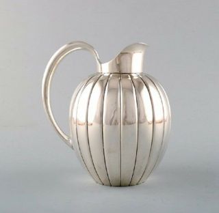 Georg Jensen art deco sterling silver jug in fluted style,  model number 856. 2
