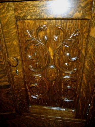 Antique oak buffet sideboard Ornate carvings tiger quarter sawn griffins beveled 3