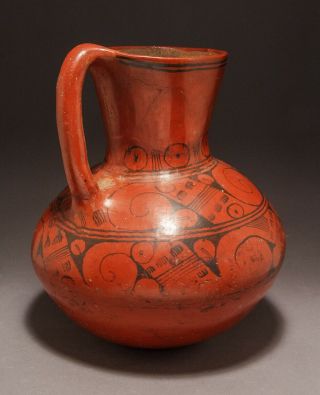 A PRE - COLUMBIAN AZTEC PITCHER,  