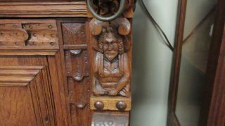 Antique Heavily Carved Oak Cabinet with Lions and Figures 8