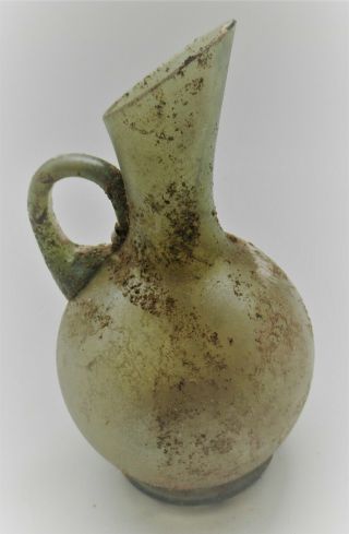 Ancient Roman Iridescent Glass Vessel With Handle Circa 200 - 300ad