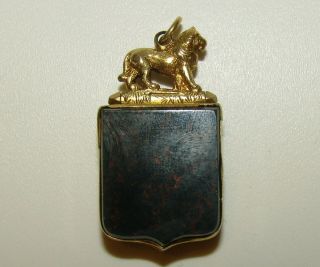 An Antique Georgian 9ct Gold Heraldic Lion Secret Compartment Locket Fob Pendant