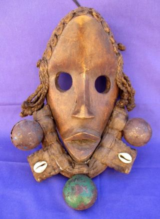 Rare Old Primitive African Folk Art Carved Wood Mask Cowrie Shells Cloth Metal