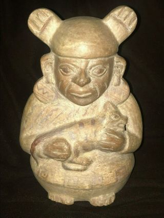 Pre Columbian Moche Peru Pottery Figural Vessel Stirrup Spout Man Holding Animal