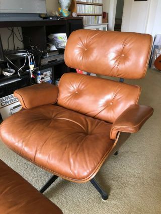 Vintage Henry Miller Eames Chair and Ottoman in walnut medium brown 5