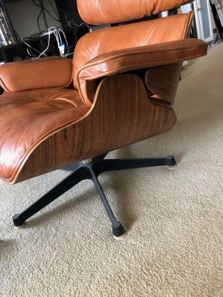 Vintage Henry Miller Eames Chair and Ottoman in walnut medium brown 6