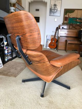 Vintage Henry Miller Eames Chair and Ottoman in walnut medium brown 8