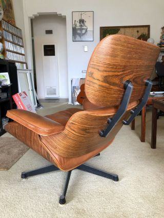 Vintage Henry Miller Eames Chair and Ottoman in walnut medium brown 9