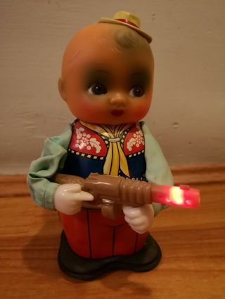 Red China Vintage Tin Wind up Battery Toy.  Shooting Boy.  MS 576. 10