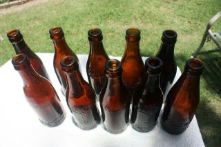 9 Amber Bottles