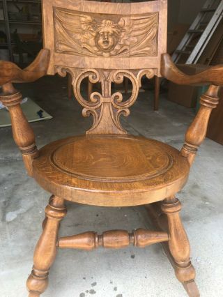 Two Antique Carved Oak Rocking Chairs