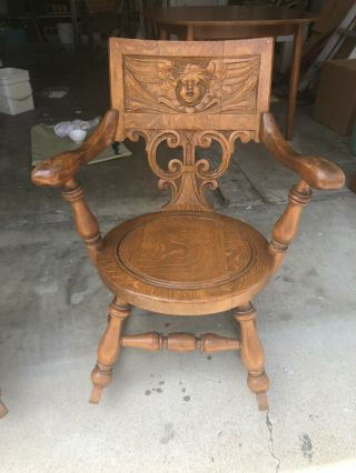 Two Antique Carved Oak Rocking Chairs 4