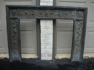 Antique Cast Iron Embossed & Metal Paneled Fireplace Surround