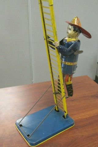 Vintage Marx Tin Litho Wind - Up Smokey Joe Fireman Ladder Toy