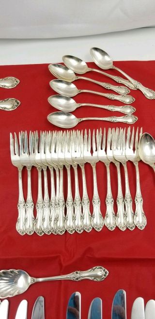 International Sterling Silver Flatware Set Wild Rose 63.  5oz without knives 62pc. 5