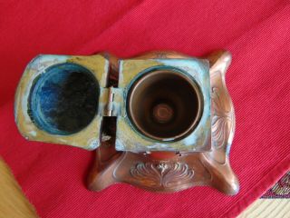 An Arts and crafts/ Art Nouveau copper Boars head Ink well.  A lovely item 6
