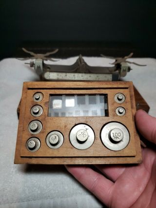 Vintage Eastman Kodak studio scale and Arthur Thomas Co.  Weights 2