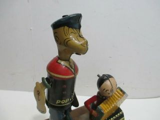 POPEYE AND OLIVE OIL JIGGER MADE BY MARX 6