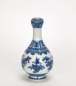 A Finely Painted Chinese Blue And White Flower Garlic Bulb Form Porcelain Vase