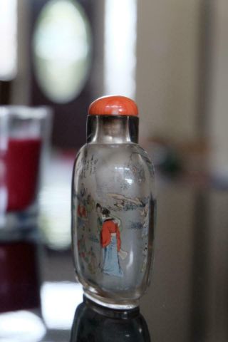 AN INSIDE - PAINTED CRYSTAL SNUFF BOTTLE.  WITH CORAL TOP. 3