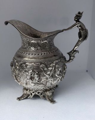 Burmese Repusse Decorated White Metal Jug C1890.  (solid Silver)