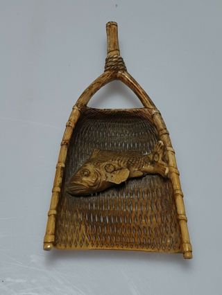 A Fine Edo Period Sashi Netsuke Of A Fish In A Net
