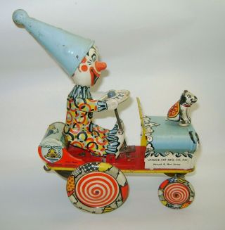 Vintage Unique Art Mfg Co.  Artie The Clown Car Tin Litho Wind Up Toy U.  S.  A 2