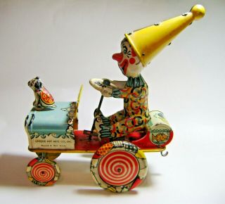 Vintage Unique Art Mfg Co.  Artie The Clown Car Tin Litho Wind Up Toy U.  S.  A 7