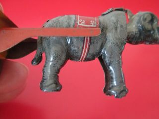 Antique GERMAN TIN PENNY TOY - ELEPHANT NODDER w/ CART - 6 of 17 listed 3