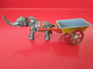 Antique GERMAN TIN PENNY TOY - ELEPHANT NODDER w/ CART - 6 of 17 listed 5
