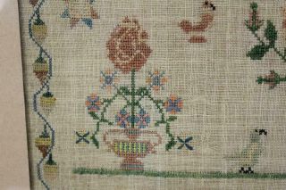 A RARE HOUSE DECORATED 1825 NEEDLEWORK SAMPLER SIGNED 