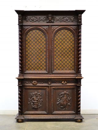 French Antique Carved Oak Hunt Cabinet With Artistic Glass