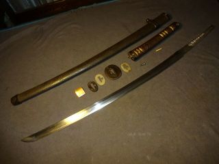 Japanese WWll NLF officer ' s sword in type 44 mountings 