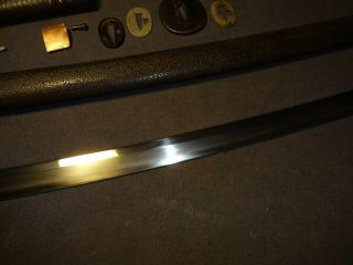 Japanese WWll NLF officer ' s sword in type 44 mountings 