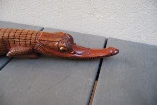 Old carved wooden crocodile Guinea 2