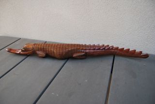 Old carved wooden crocodile Guinea 3