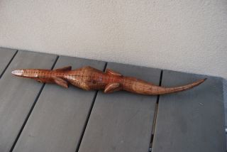 Old carved wooden crocodile Guinea 4