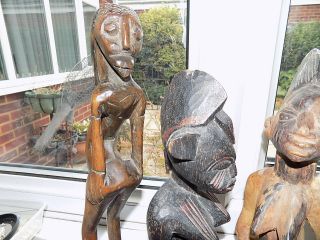 4 X VINTAGE HAND CARVED WOODEN TRIBAL AFRICAN FIGURES LARGEST 31.  75 cm tall 11
