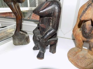 4 X VINTAGE HAND CARVED WOODEN TRIBAL AFRICAN FIGURES LARGEST 31.  75 cm tall 9
