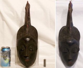Very Old Large African Baule Carved Wooden Mask With A Bird At The Top