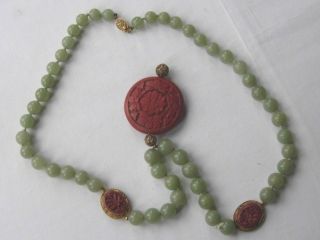 Chinese jade and cinnabar necklace knotted with gilded silver filigree settings 5