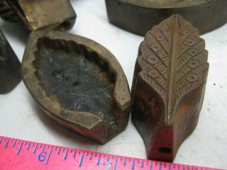 THREE BRONZE LEAF MOLDS,  MILLINERY FLOWER IRONS,  AFT.  TOOL AND ? 8