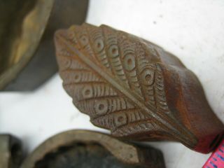 THREE BRONZE LEAF MOLDS,  MILLINERY FLOWER IRONS,  AFT.  TOOL AND ? 9