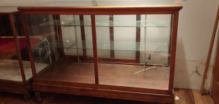Large Antique Display Case With Wavy Glass And Claw Feet