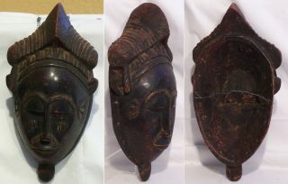 Four old carved wooden African masks Baule and Dan 5