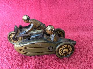 Windup Clockwork Tin German Army Motorcycle Sidecar Machine Gun Gunner Penny Toy