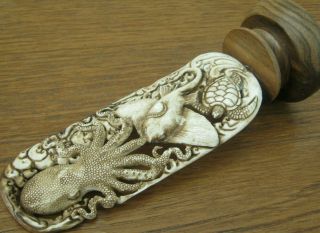 Unusual Carved Buffalo Bone Scrimshaw Of Octopus Hunting A Ray On Wood Base