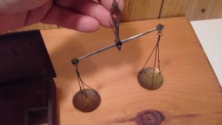 antique hanging balance trade scale in wooden box with weights 7