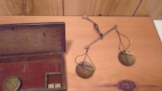 antique hanging balance trade scale in wooden box with weights 8
